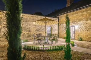 Courtyard Cottage Walled Courtyard at Night